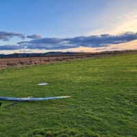 A 4 metre wingspan glider shown with the setting sun